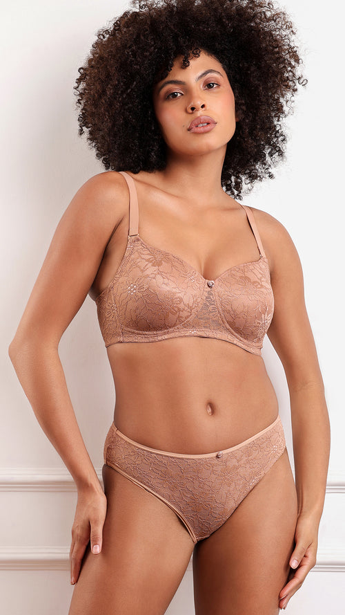 Nude lace bra and brief set, standing front view.