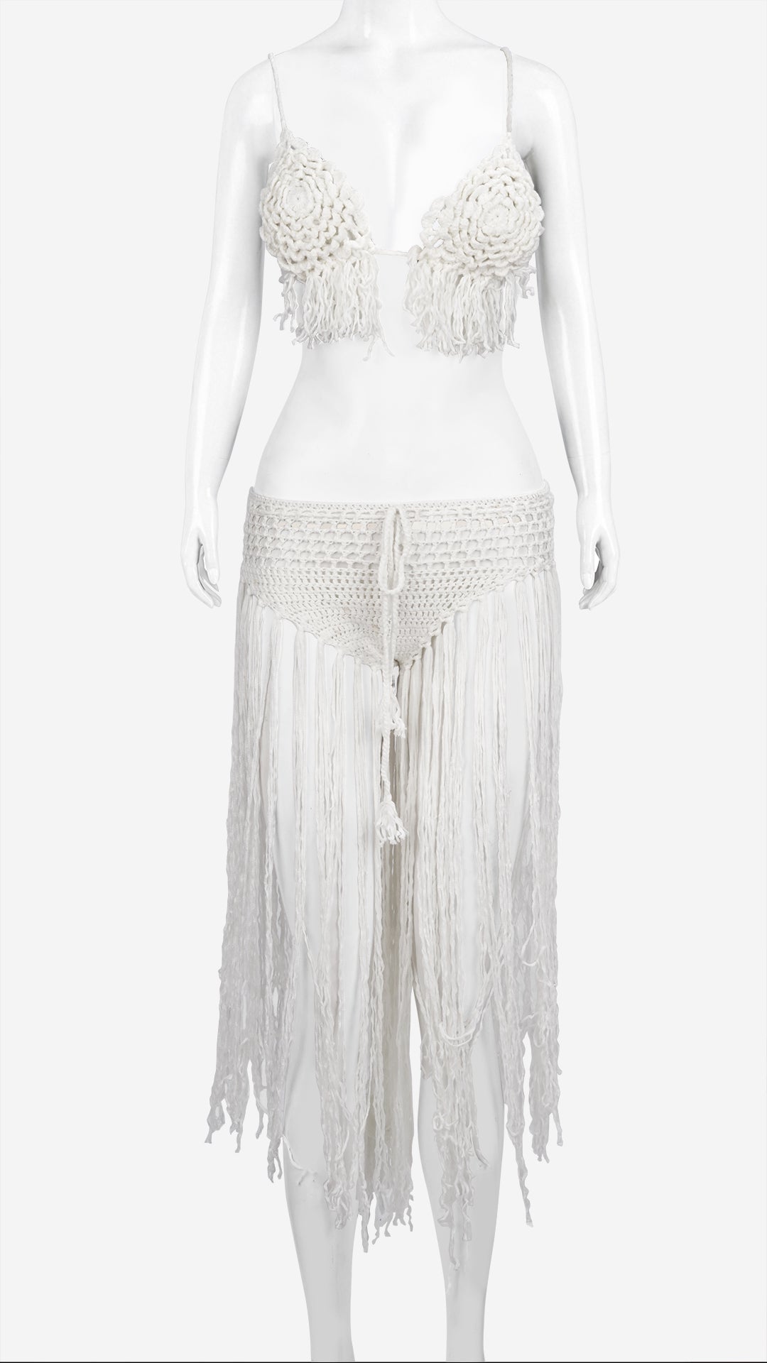 White crochet fringe bralette and fringe skirt set on mannequin, front view