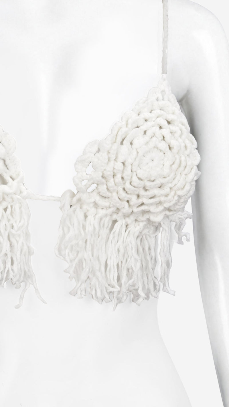 Close-up of white crochet triangle bralette floral knit detail