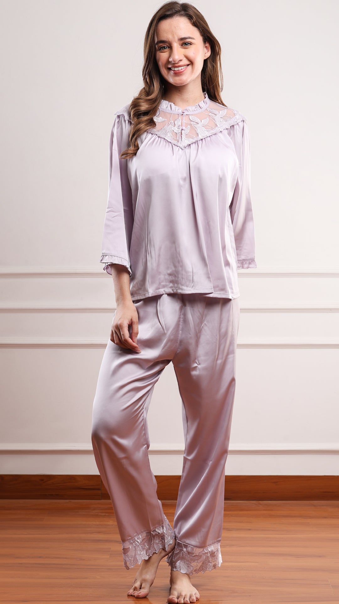 Full-length lavender satin sleepwear set with floral lace hem pants