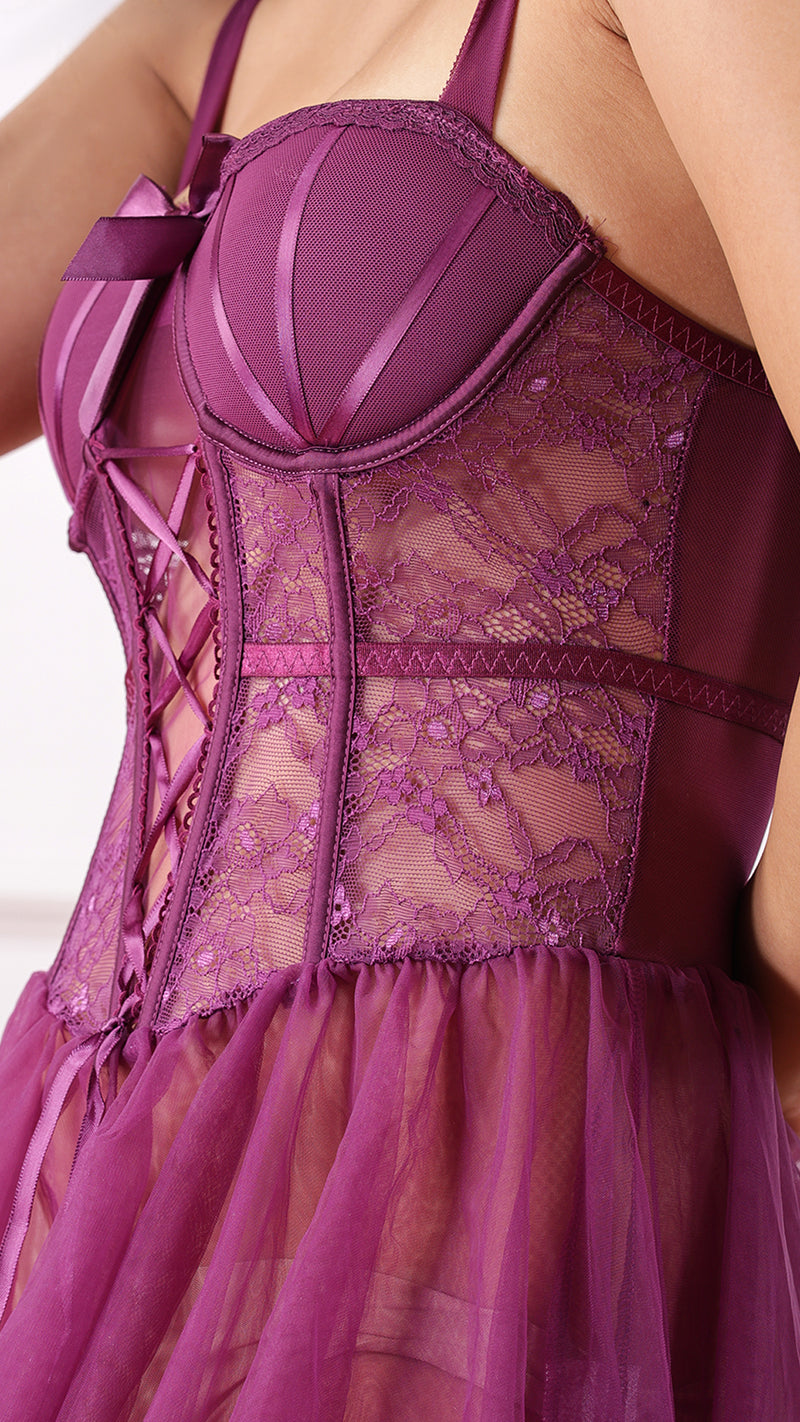 Close-up of purple corset lace-up front and lace panel detail