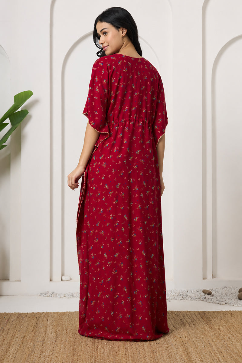 Back view of a woman in a red ditsy floral kaftan