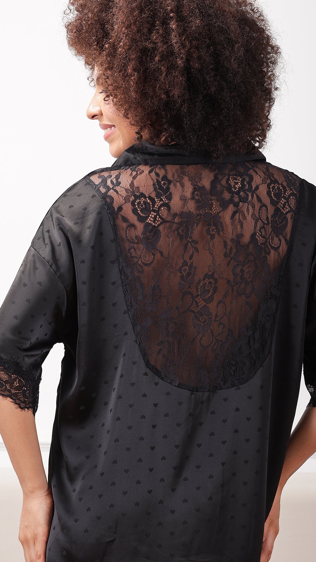 Black satin button-down sleep shirt, side view