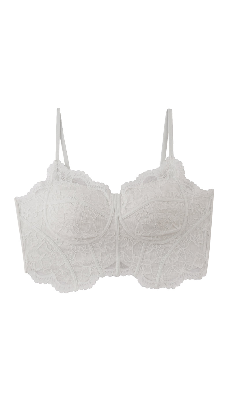 Product shot of white lace longline corset bra on white background