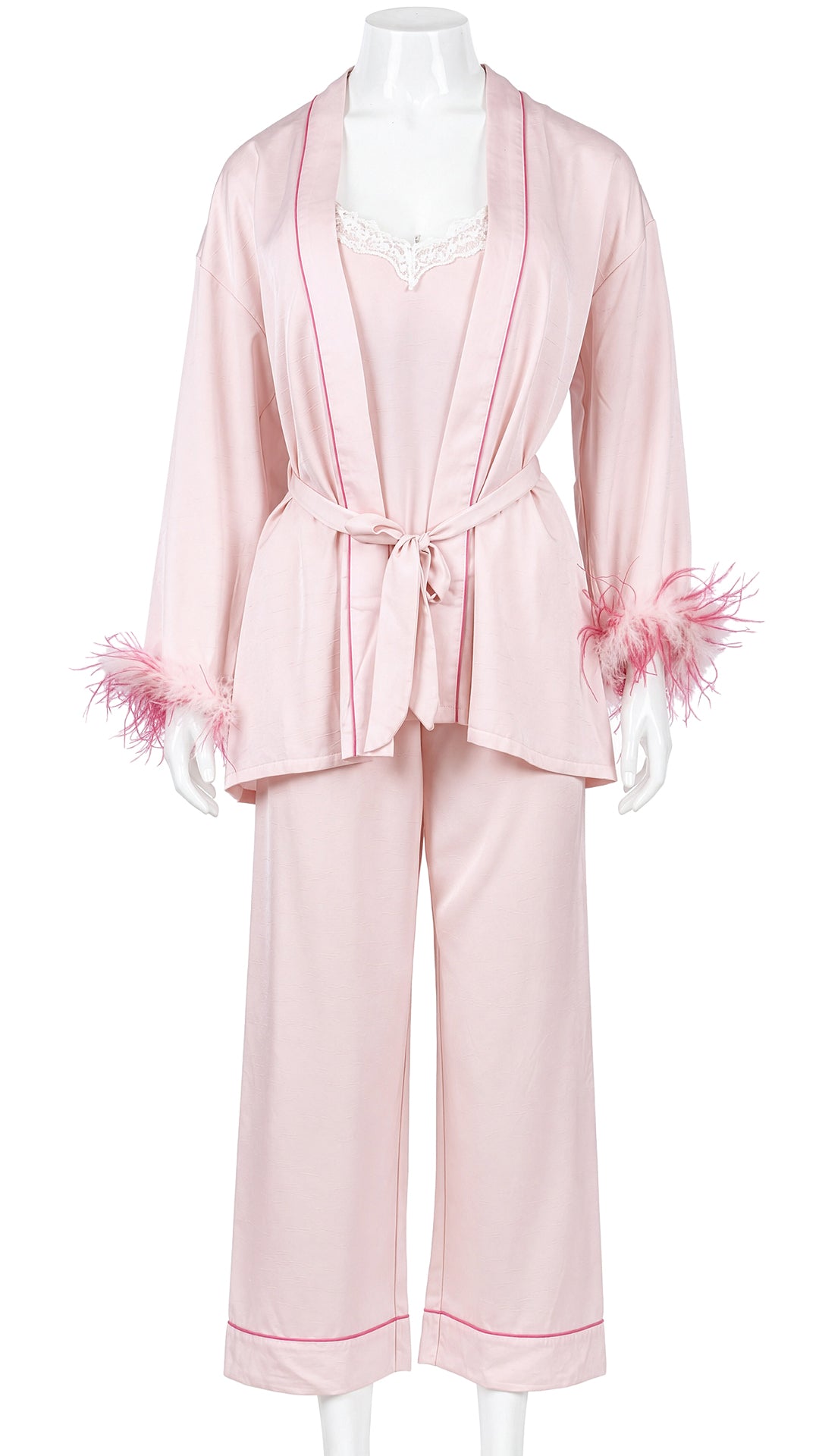 Mannequin display of pink satin feather-cuff robe and pajama set