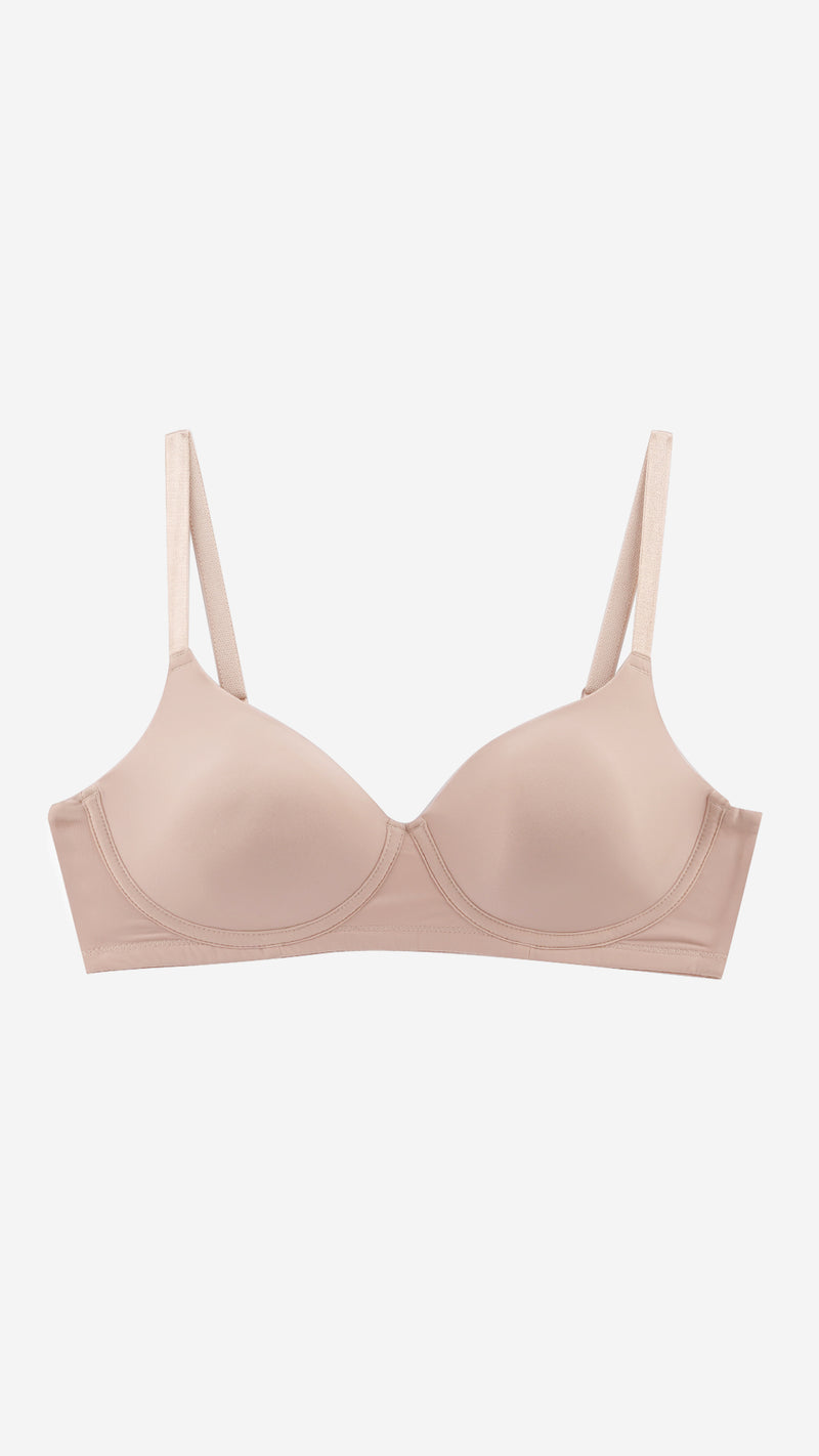 Beige non-wired deep plunge bra on white background, front flat lay