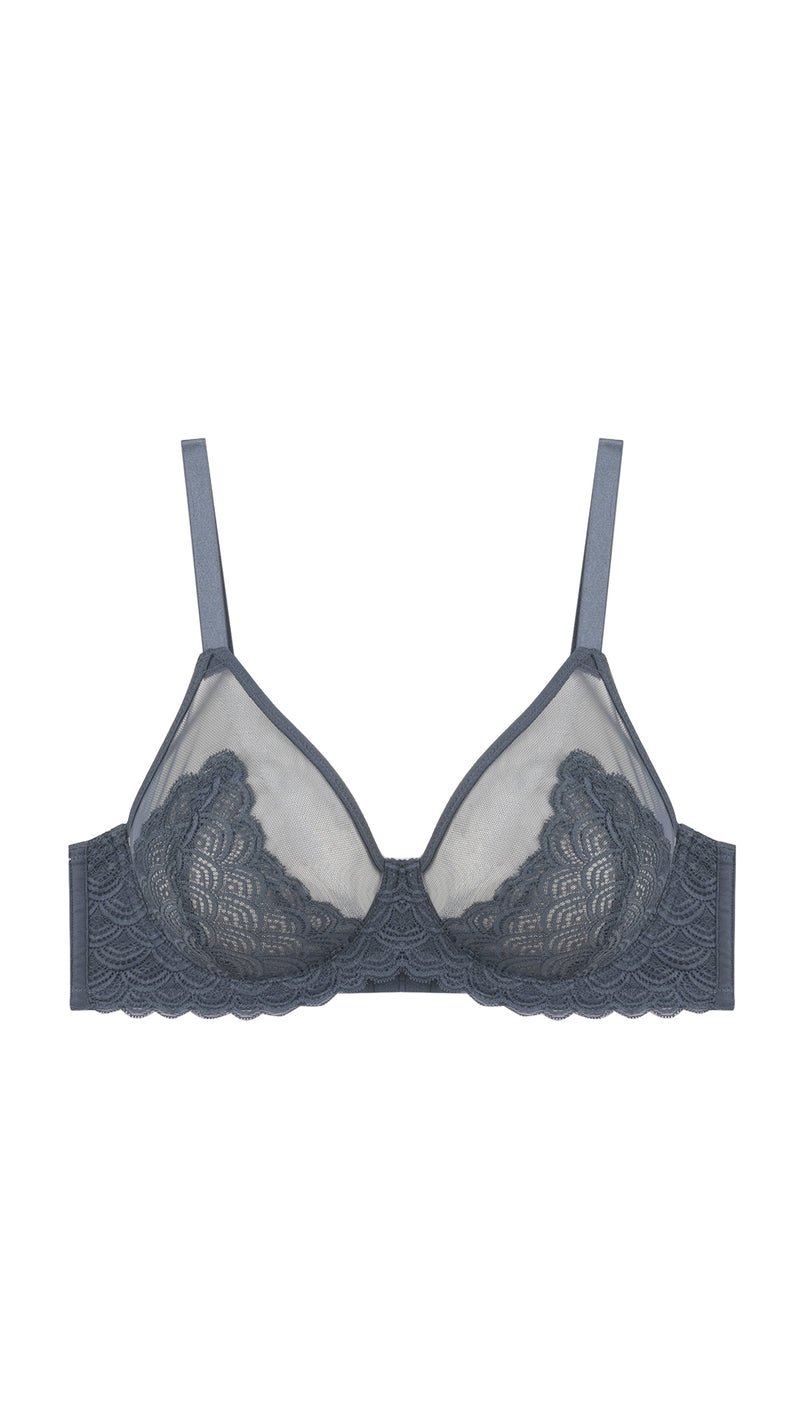 Close-up of grey lace demi bra strap and scalloped cup edge on white background