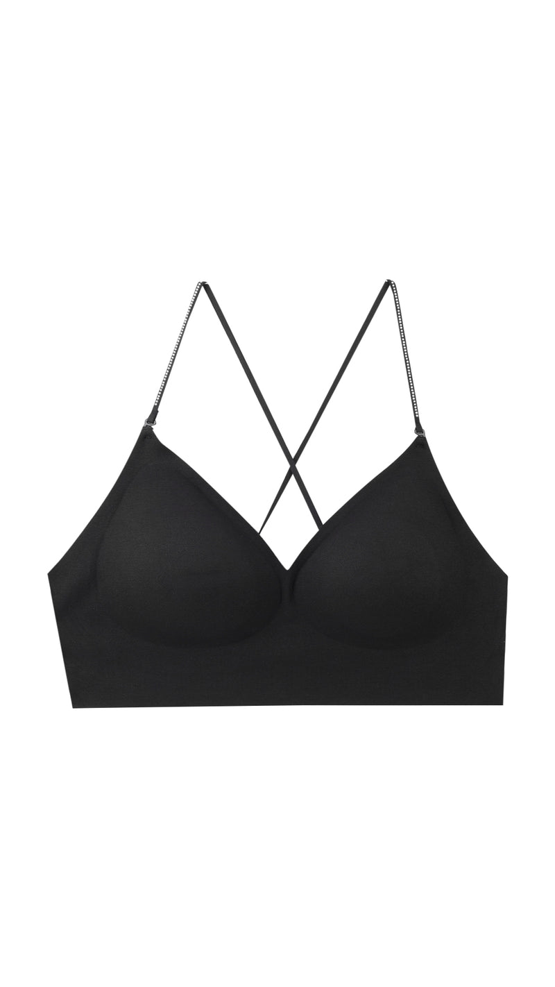 Product shot of black criss-cross back bralette on white background