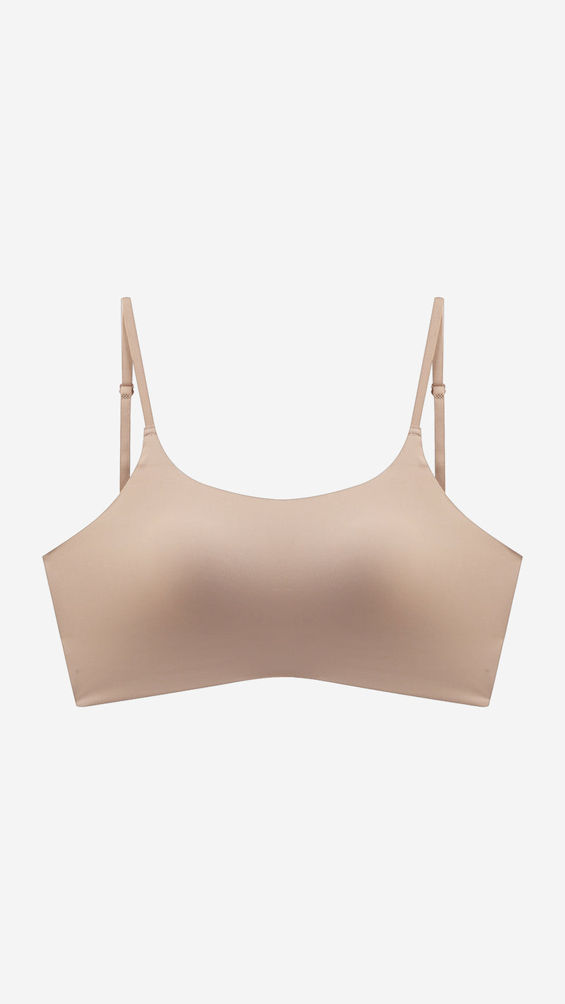 Product shot of seamless cami bralette on white background