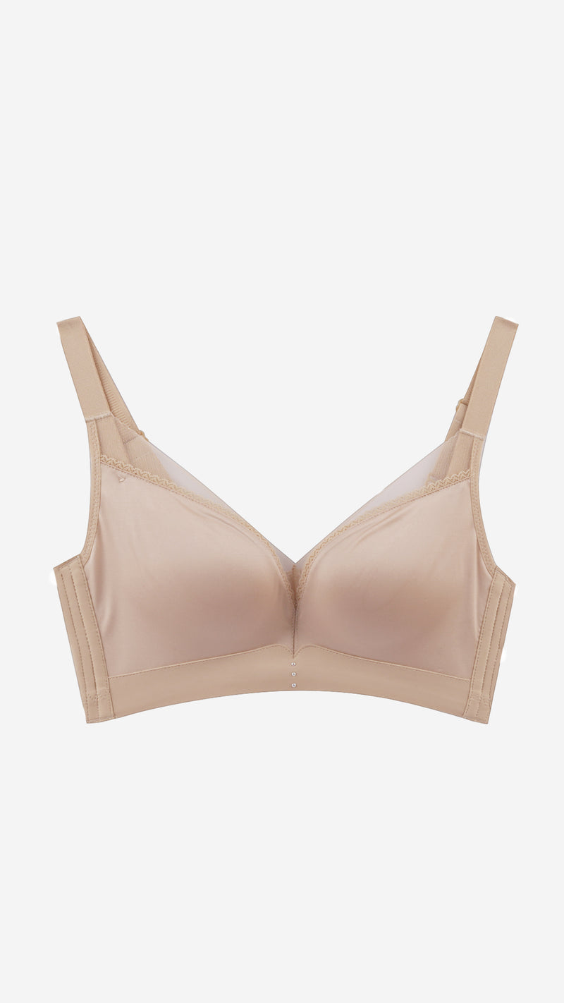 Product shot of beige full coverage T-shirt bra on white background