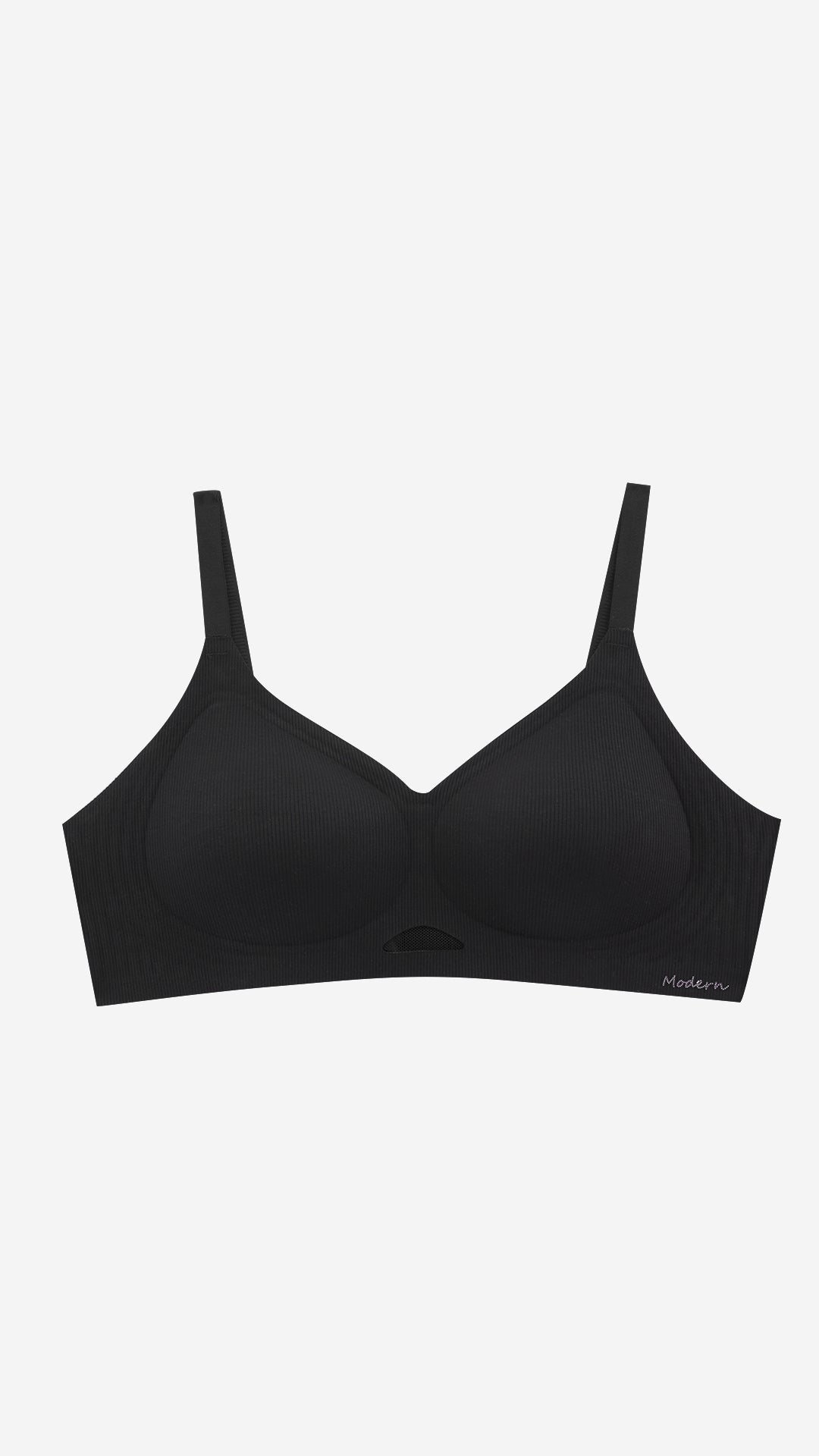 Black wireless full coverage bra on white background, front flat lay