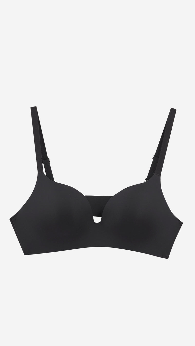 Product shot of black seamless push-up bra on white background