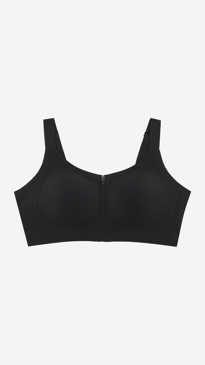Black front-zip sports bra on white background, front flat lay