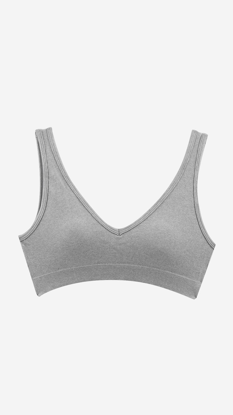 Beige ribbed V-neck wireless bra on white background, front flat lay