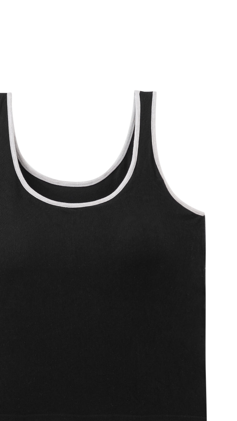 Close-up of contrast trim detail on tank top neckline