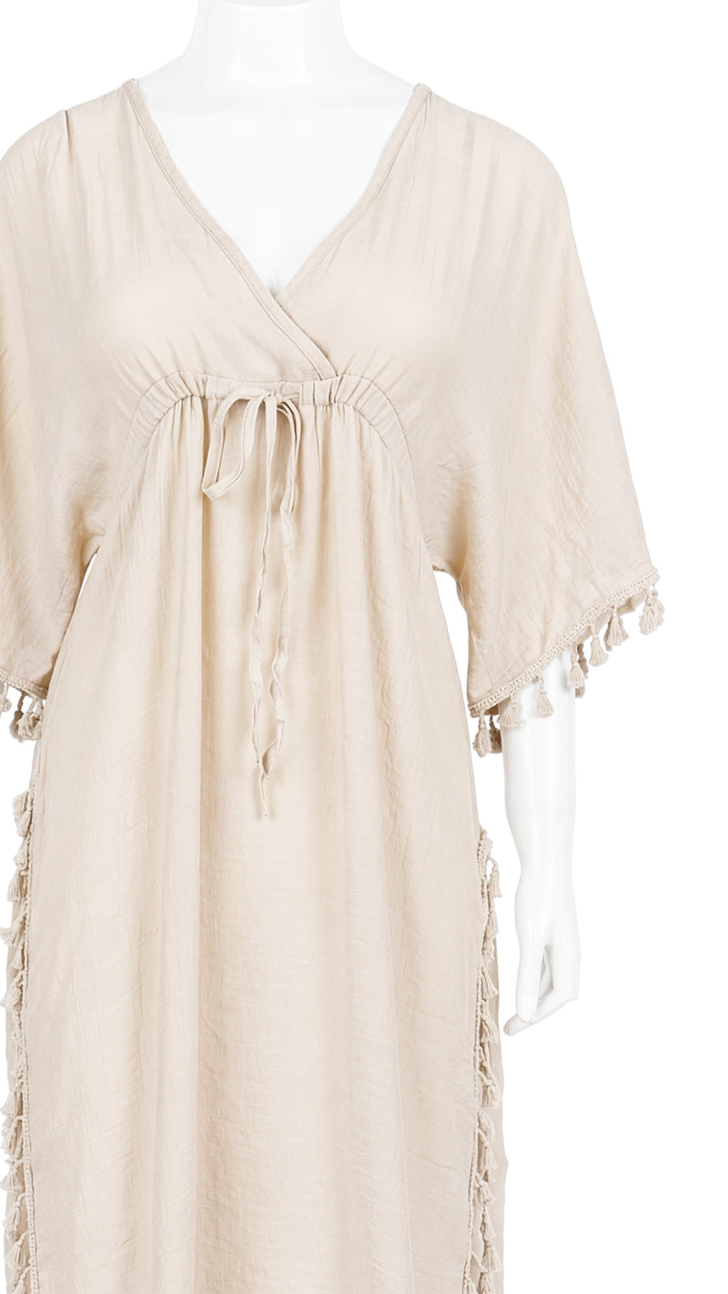 Close-up product shot of beige kaftan bodice and tie detail