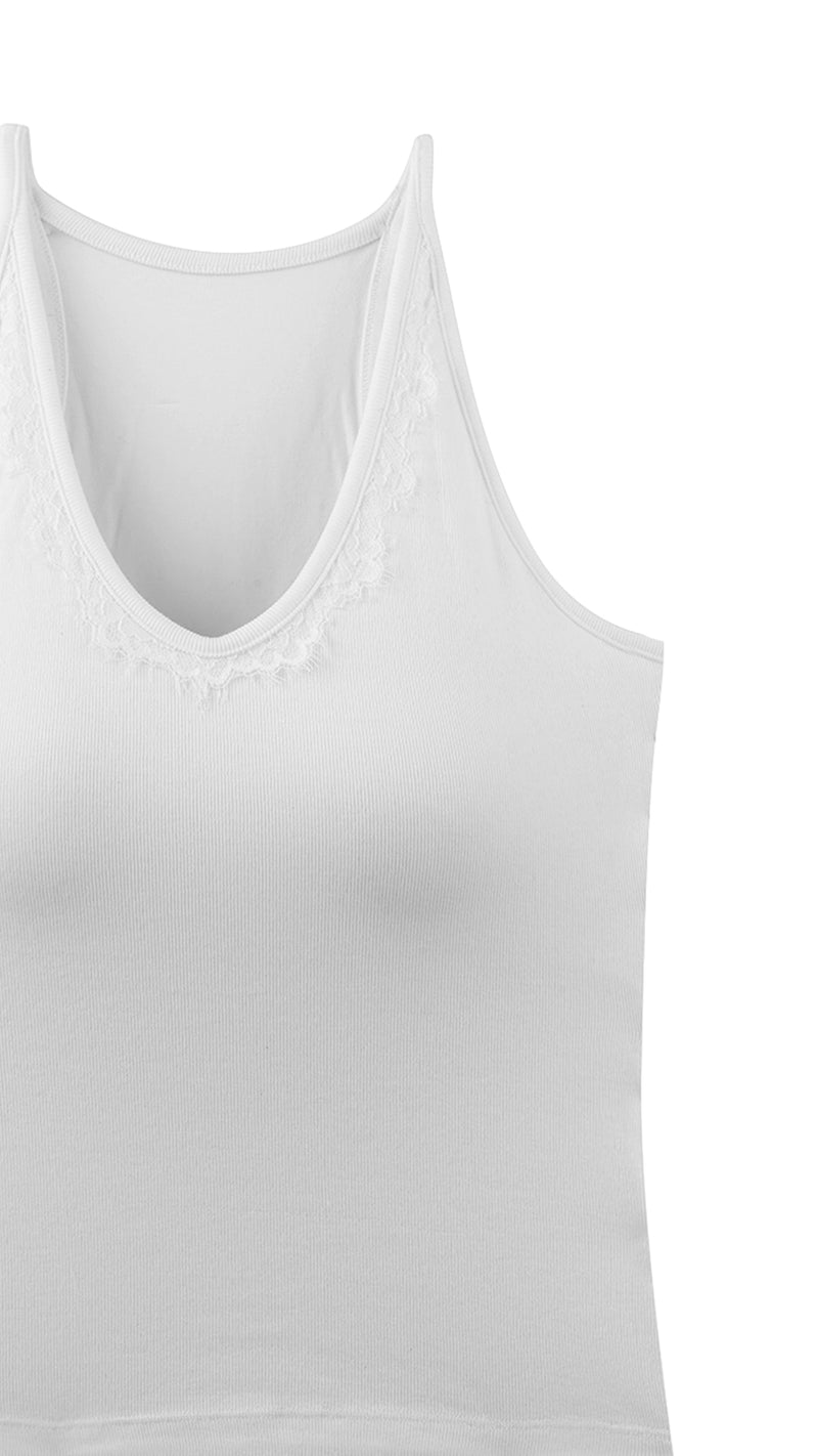 Close-up of lace trim detail on white tank top neckline