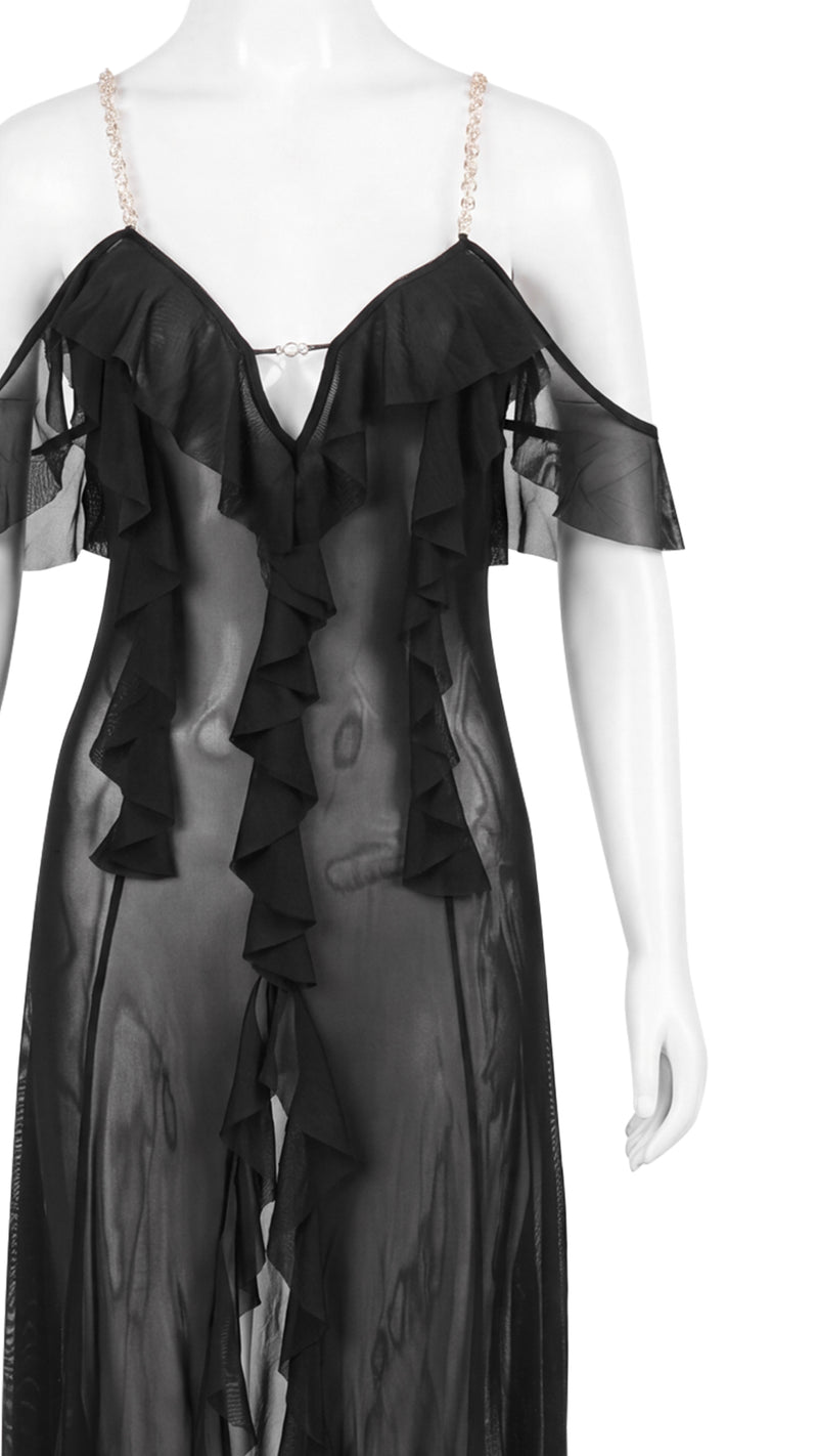 Close-up product shot of black sheer gown chain straps and ruffle back