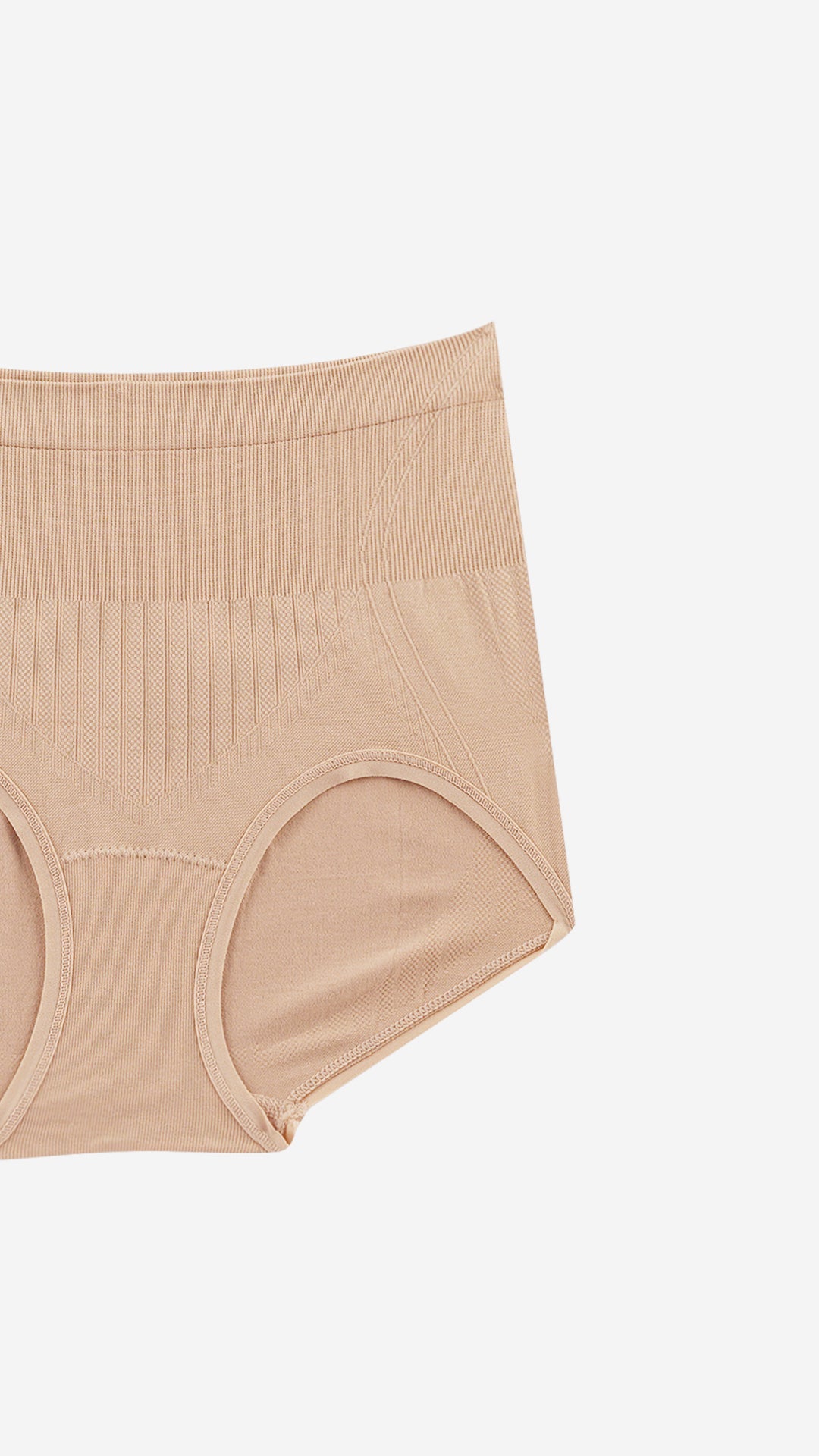 Close-up product shot of beige shaper brief ribbed panel detail