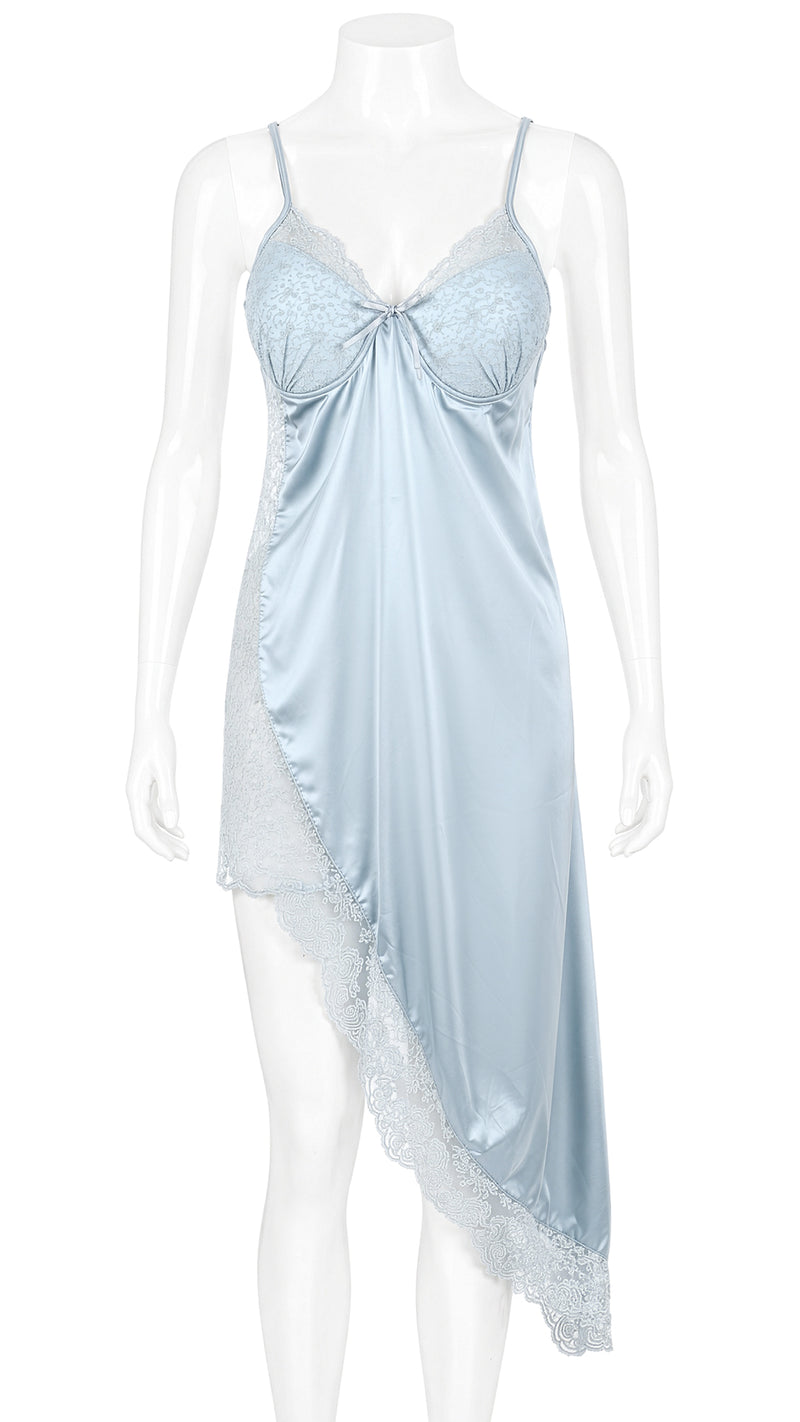 Mannequin display of pale blue satin nightgown with asymmetric lace hem
