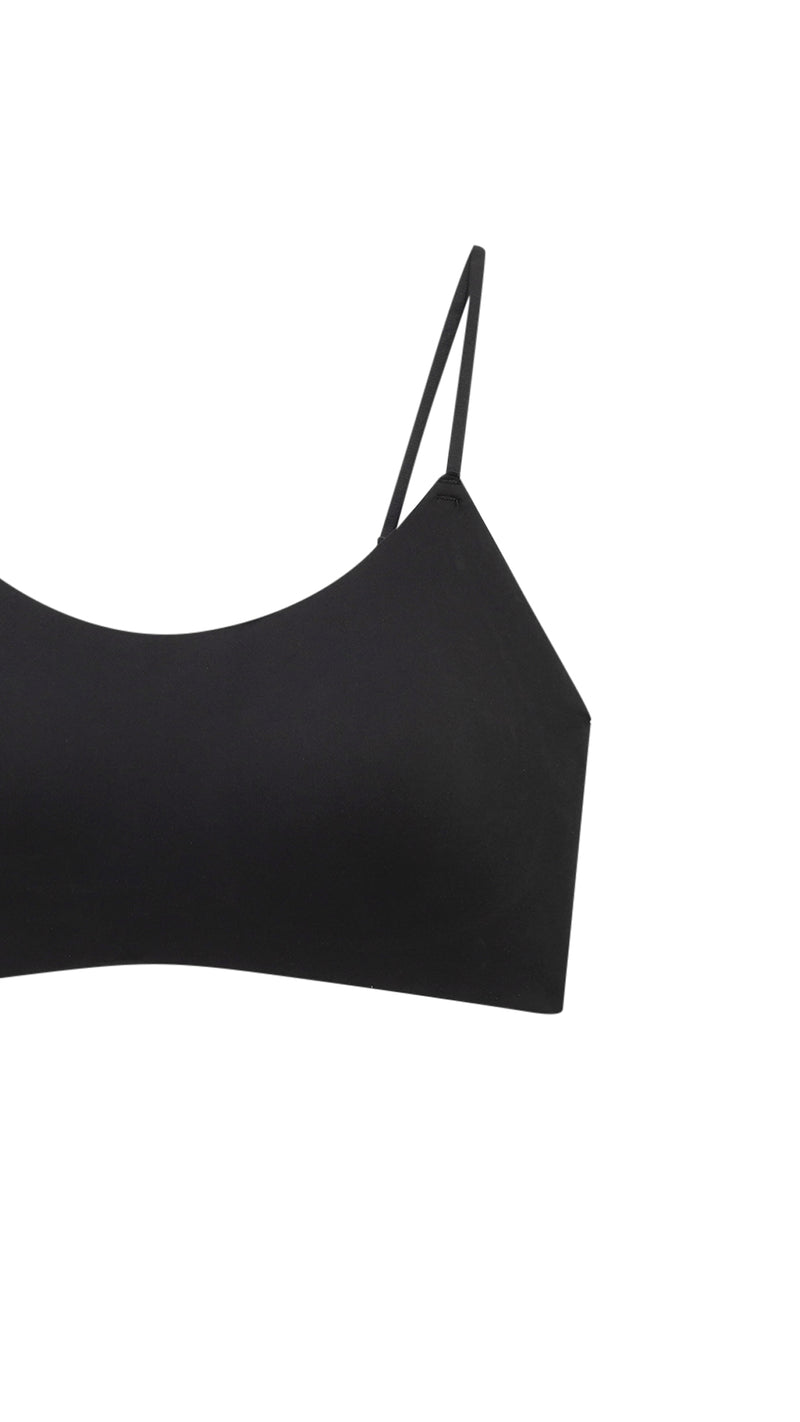 Close-up product shot of bralette strap crisscross detail
