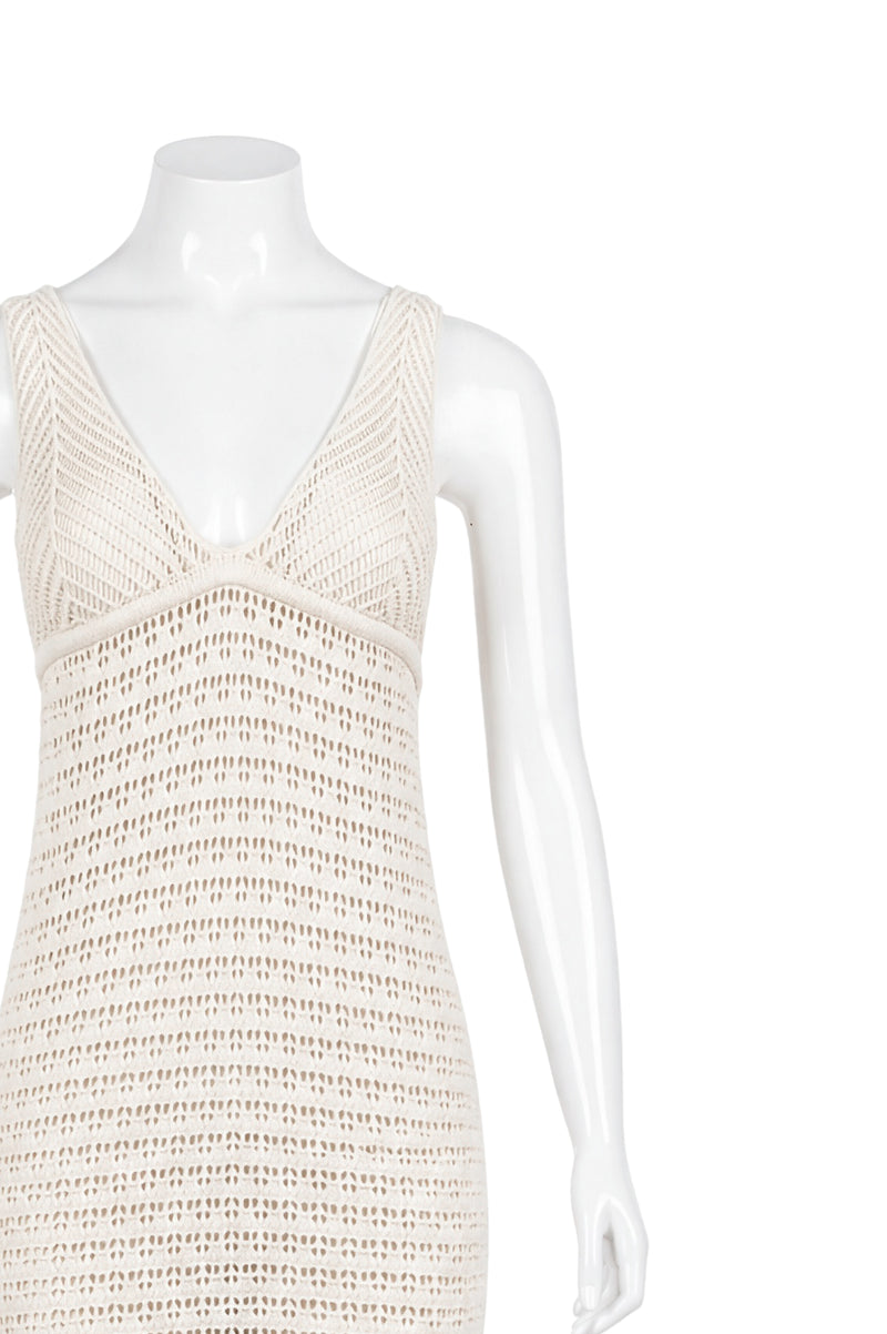 Close-up of beige crochet dress bodice and neckline detail