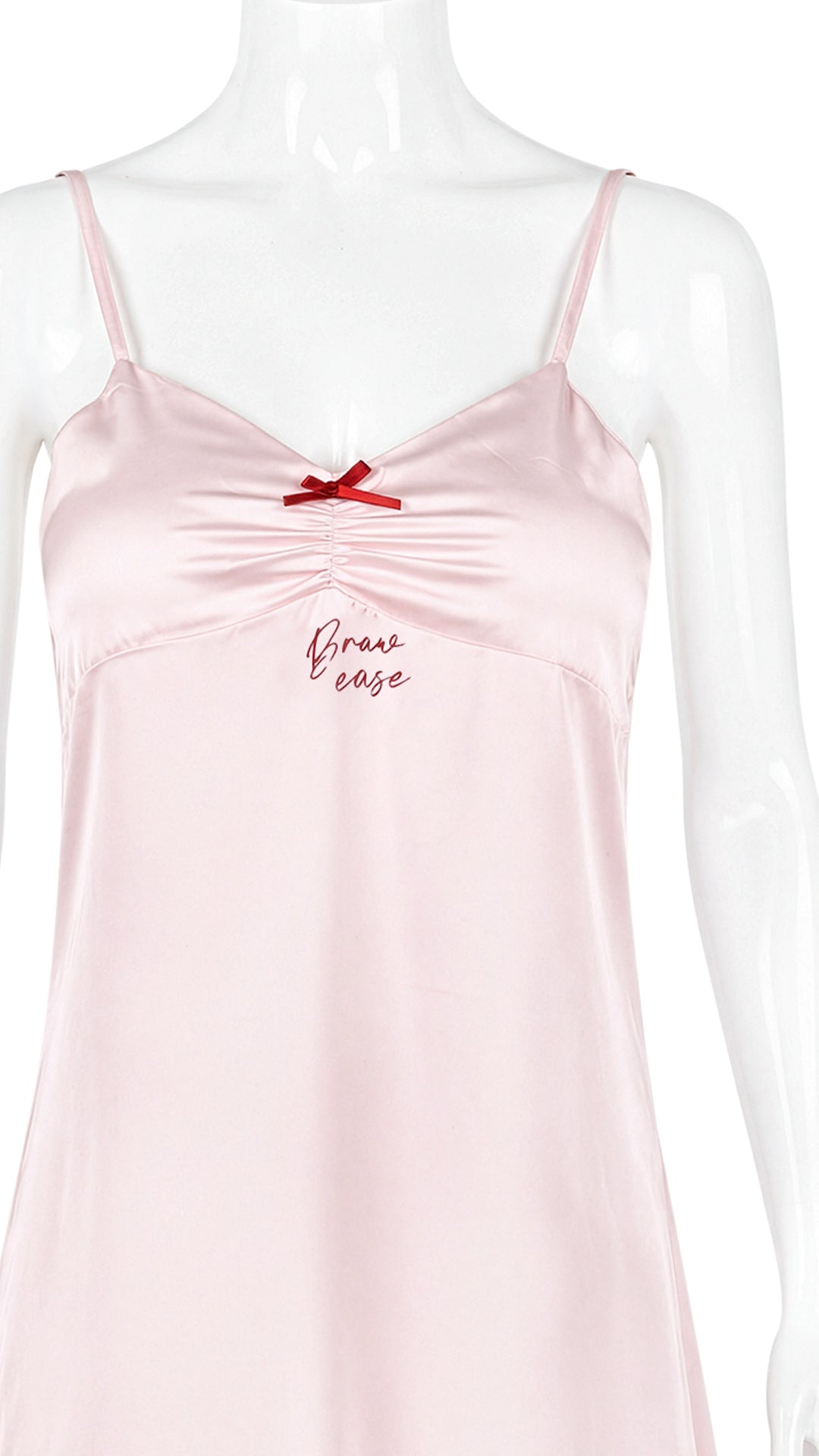 Close-up of pink satin chemise "Brave ease" embroidery detail