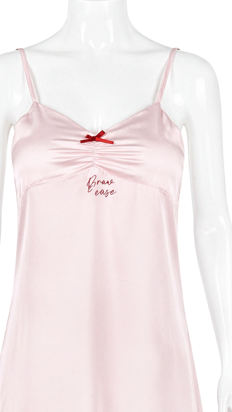 Close-up of pink satin chemise "Brave ease" embroidery detail