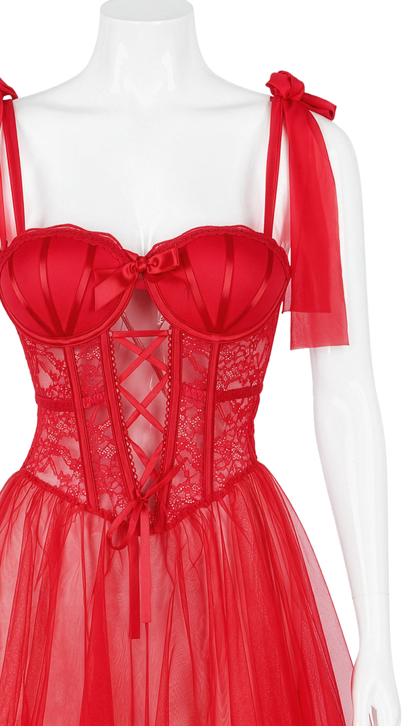 Close-up mannequin shot of red corset bodice and lace-up detail