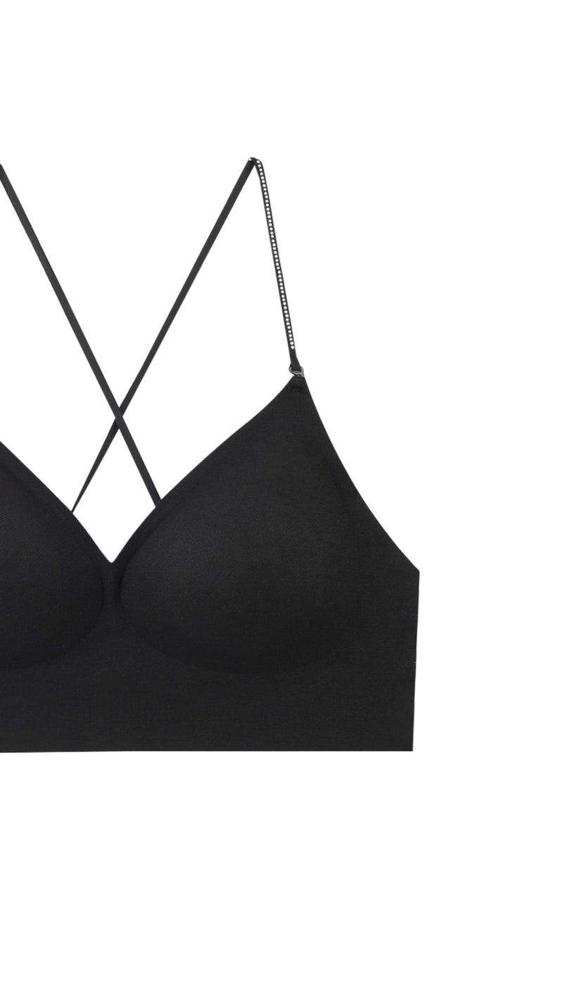 Close-up product shot of bralette strap crossover detail