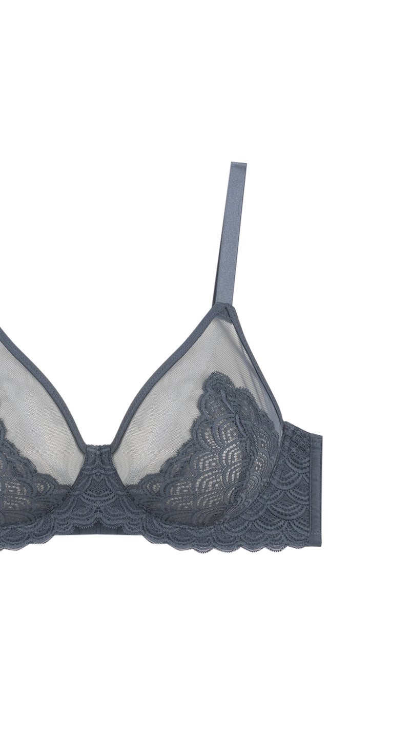 Close up of grey lace demi bra