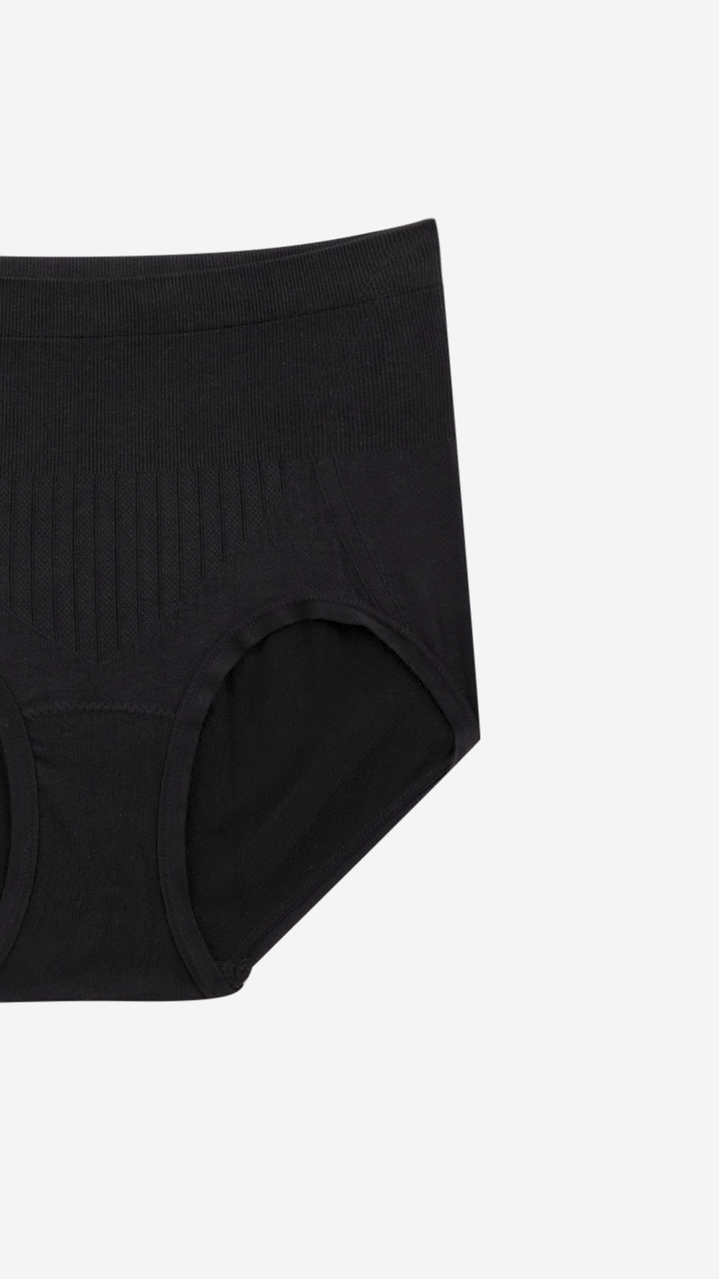Close-up of black high-waist shaper brief ribbed panel on white background