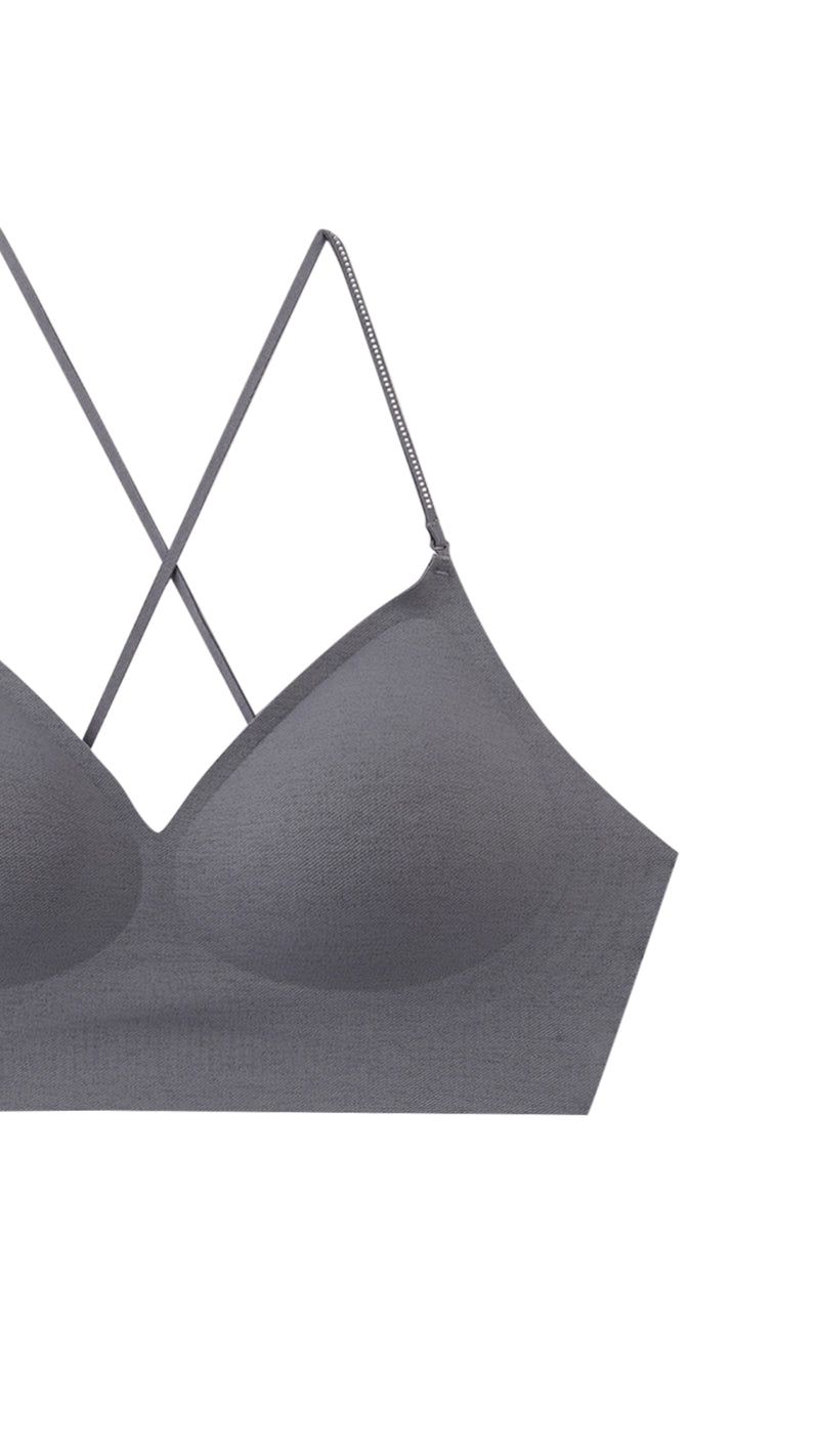 Close-up product shot of bralette strap crossover detail