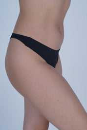 AXTZH Elegant Women’s Thong with Soft Fabric Finish and Decorative Bow Touch XTHGSBAL6022IJ-BLACK