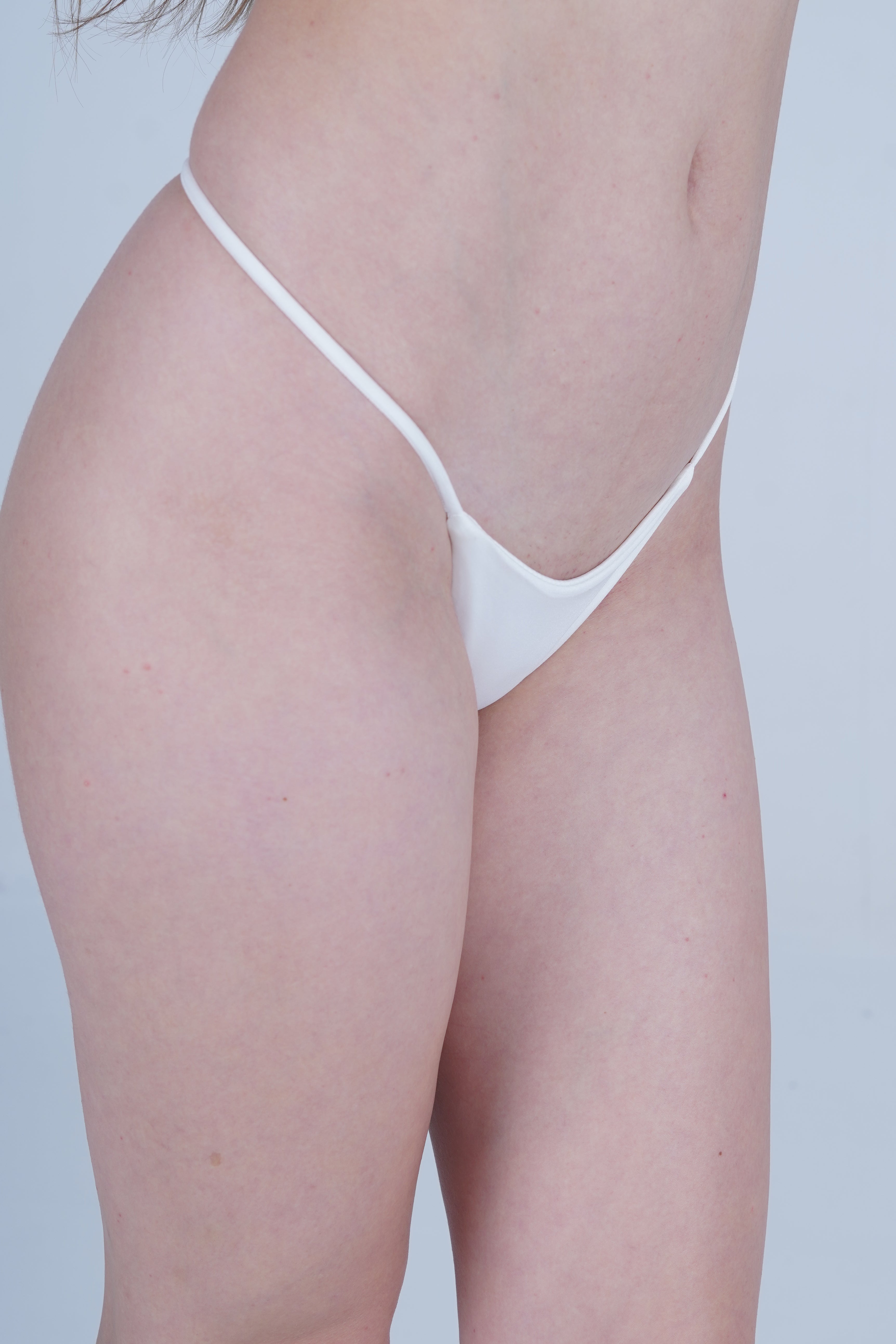 AXTZH Elegant Women’s Thong with Soft Fabric Finish and Decorative Bow Touch XTHGRBAL9808IJ-WHITE