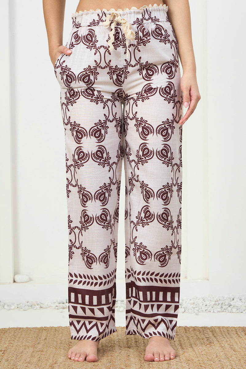 Close up of the floral print and drawstring waist on the pyjama pants