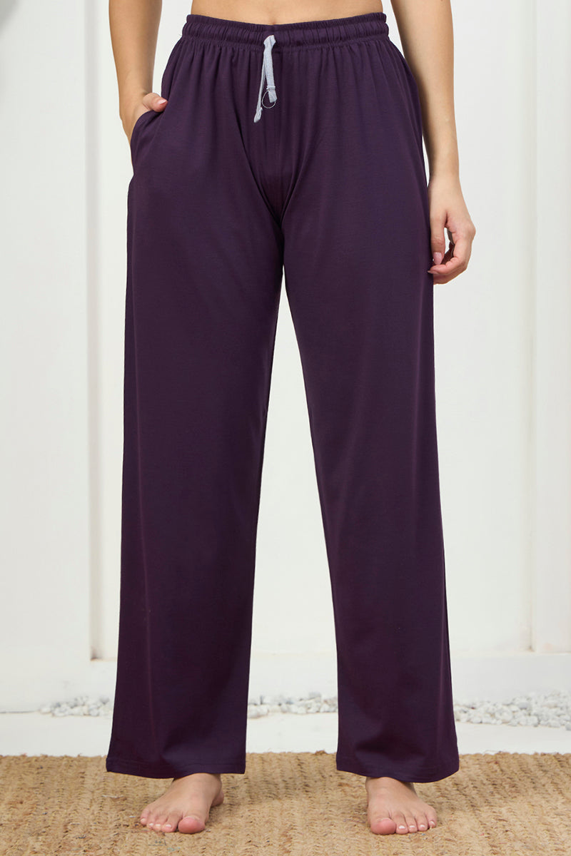 Close up of the drawstring waist on the purple pyjama pants