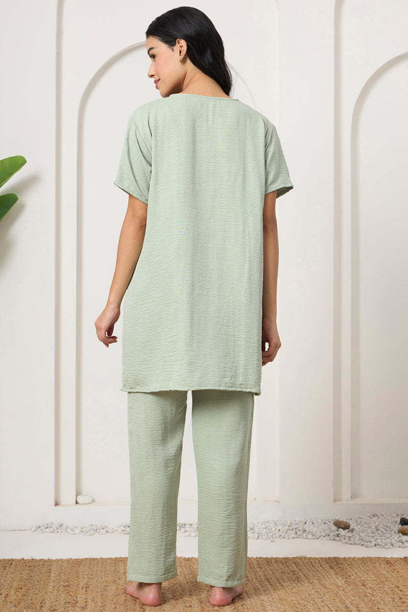 Back view of a woman wearing a sage green co-ord set