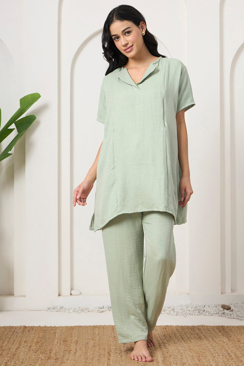 Woman standing in a sage green textured co-ord set