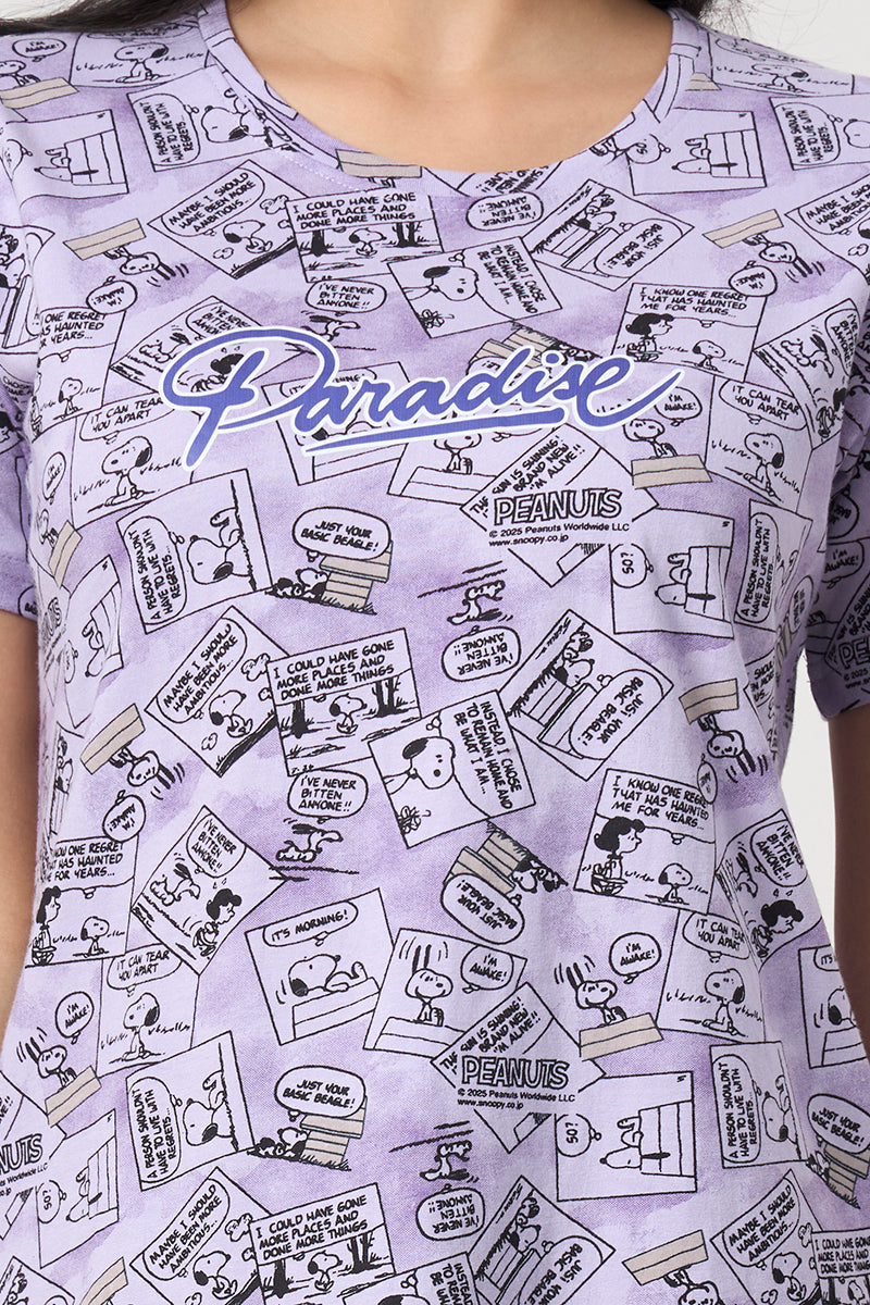 Close up of the round neckline and print detail on the lilac top