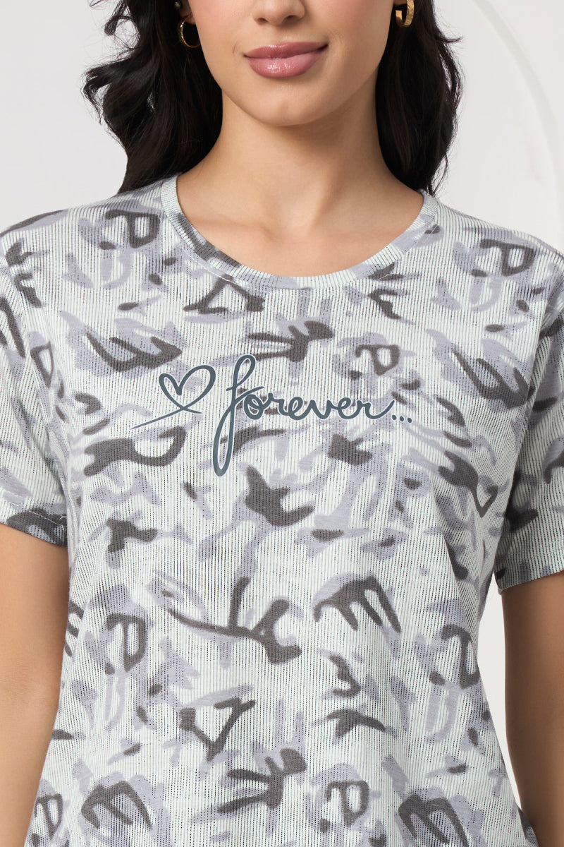 Close up of the forever graphic print on the grey t-shirt
