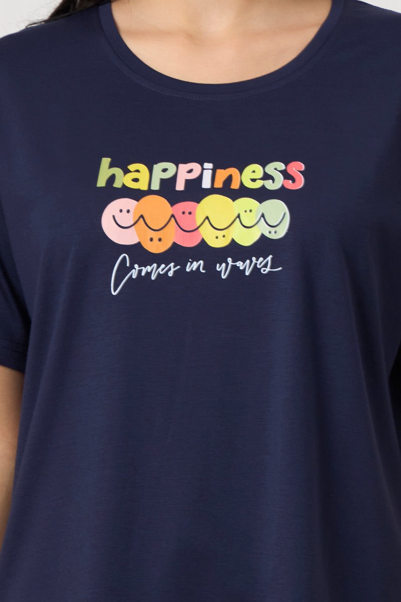 Close up of the happiness graphic print on the navy t-shirt