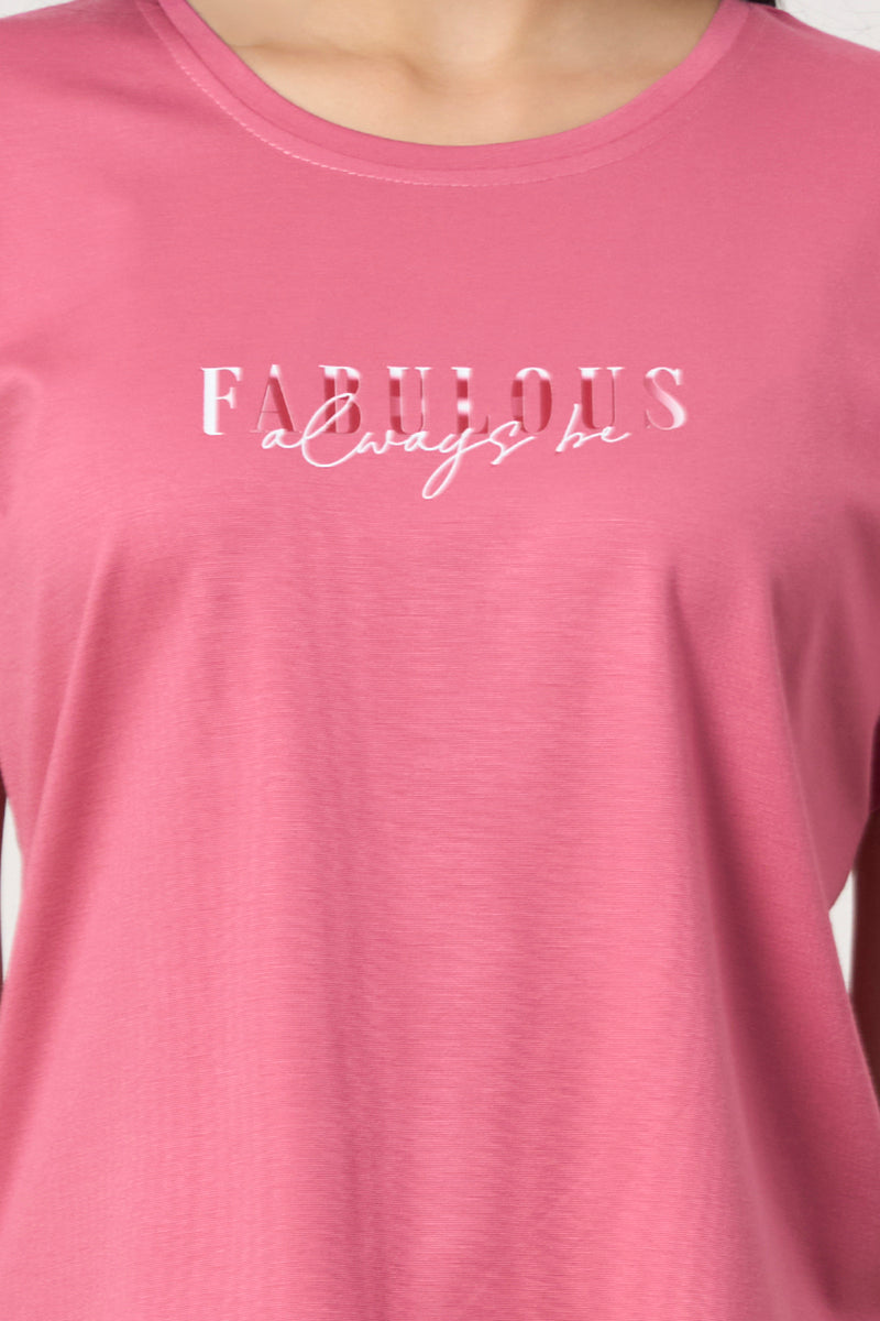 Close up of the fabulous graphic print on the pink t-shirt