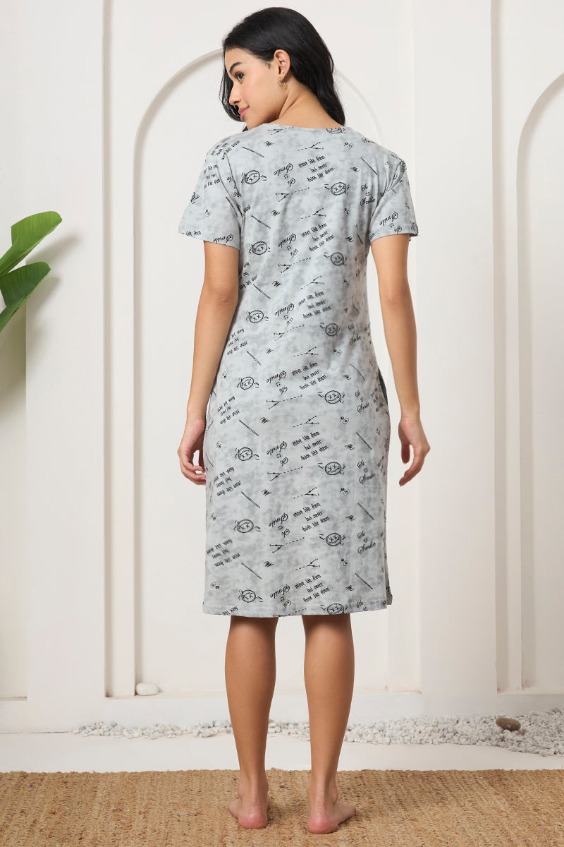 Back view of a woman wearing a grey printed nightdress