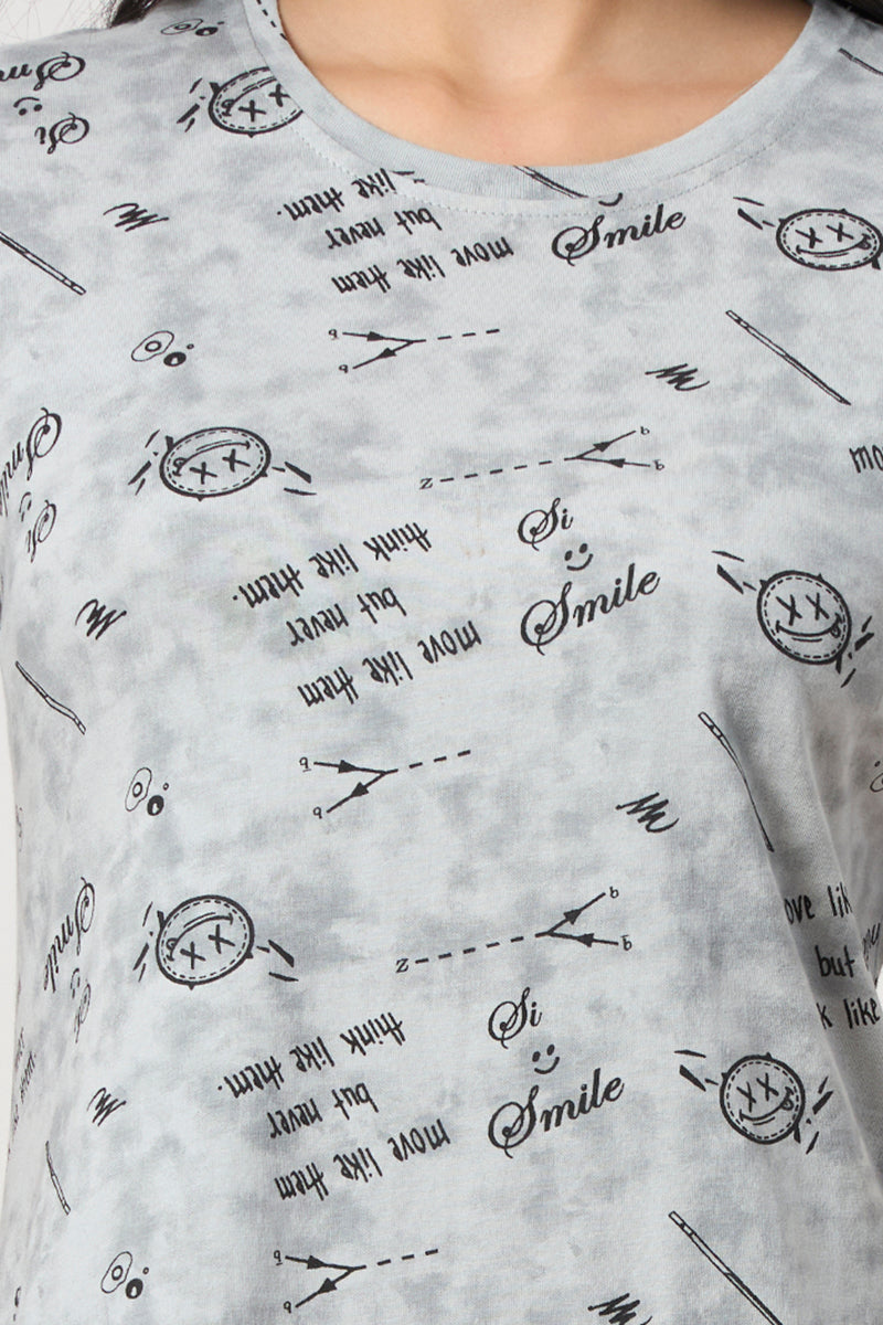 Close up of the smile graphic print on the grey nightdress