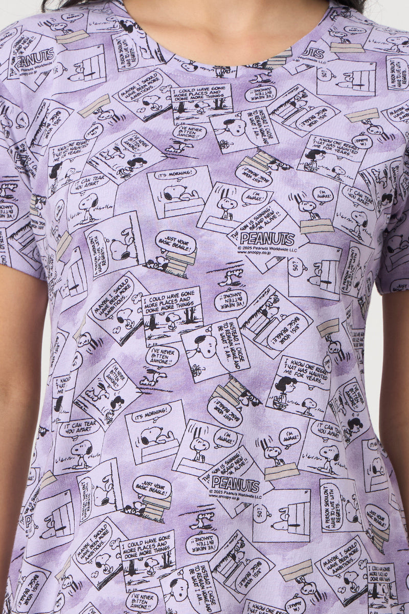 Close up of the comic strip print detail on the lavender nightdress