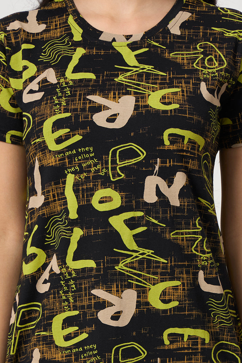 Close up of the typographic print texture on the black nightdress