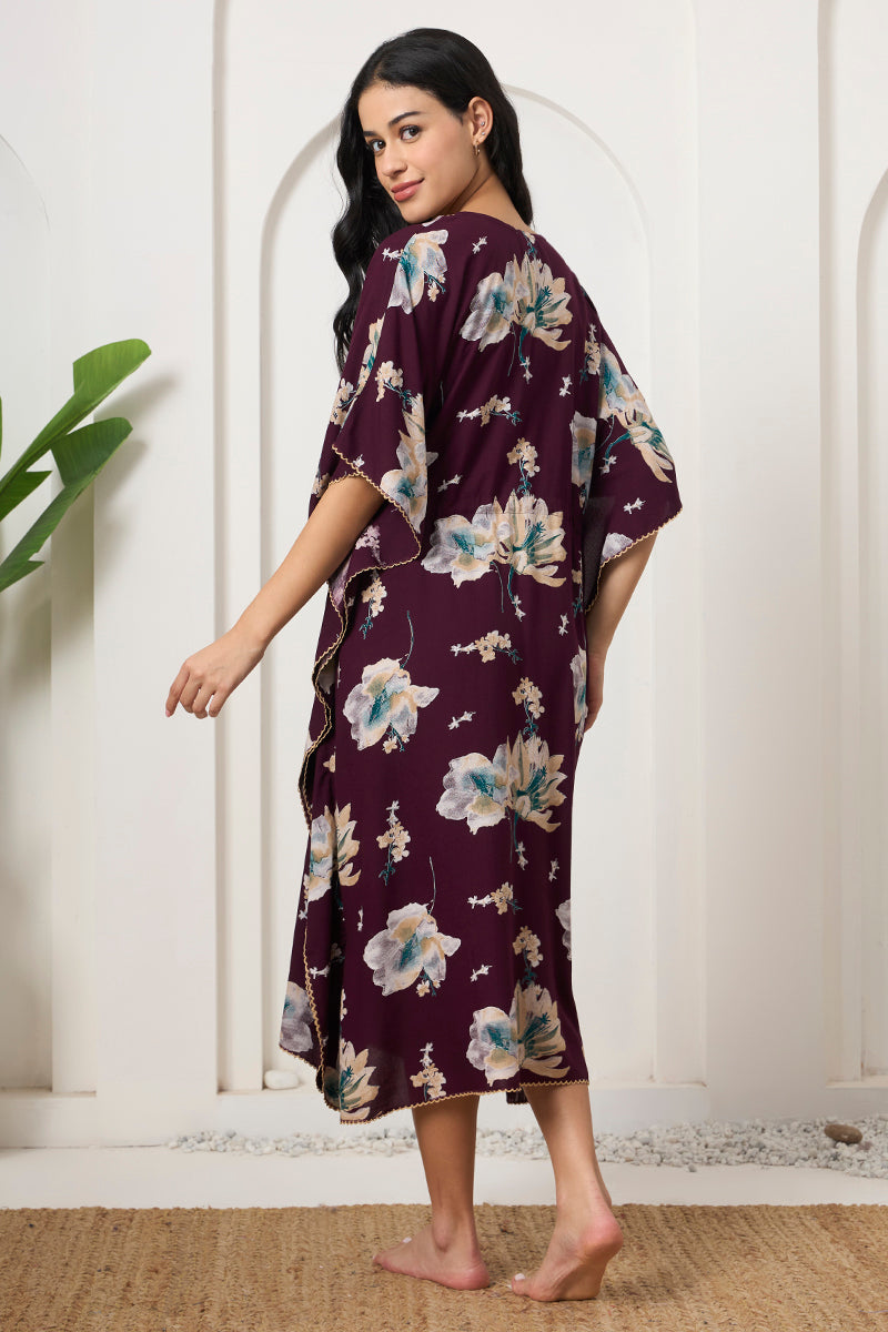 Back view of a woman wearing a wine floral kaftan