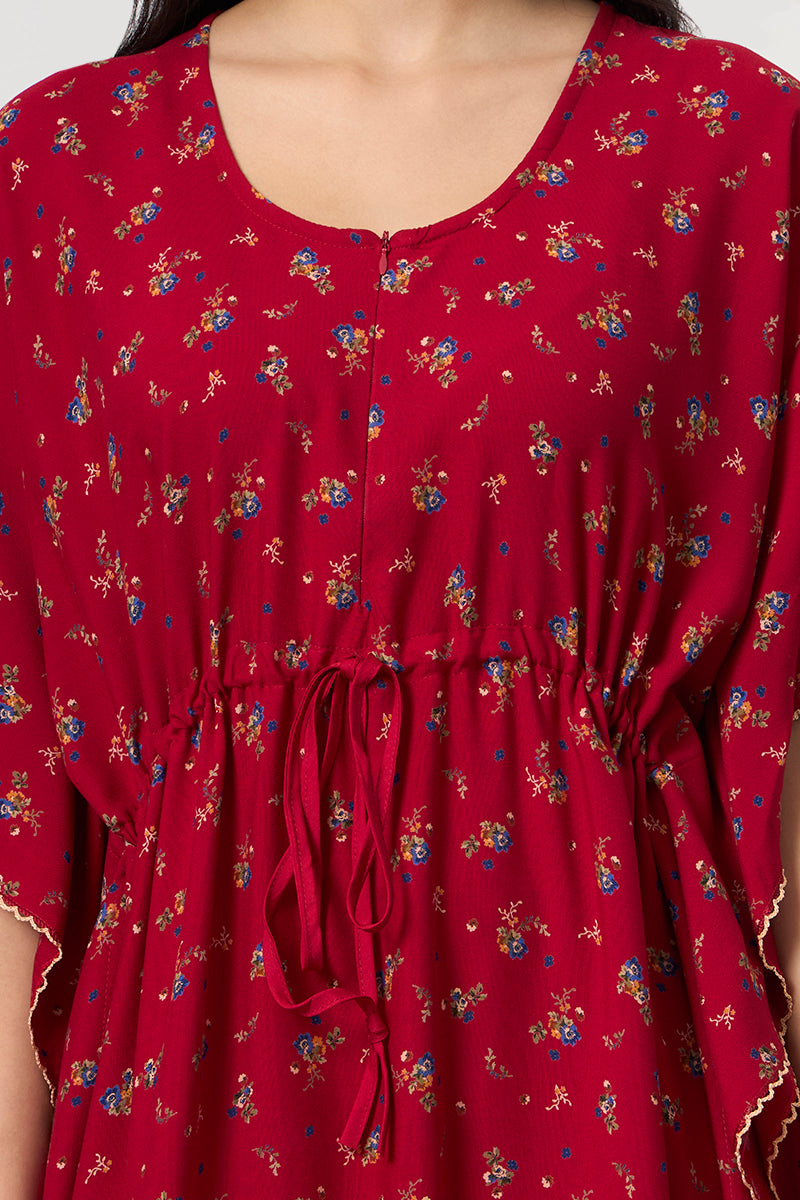 Close up of the drawstring waist detail on the red floral kaftan