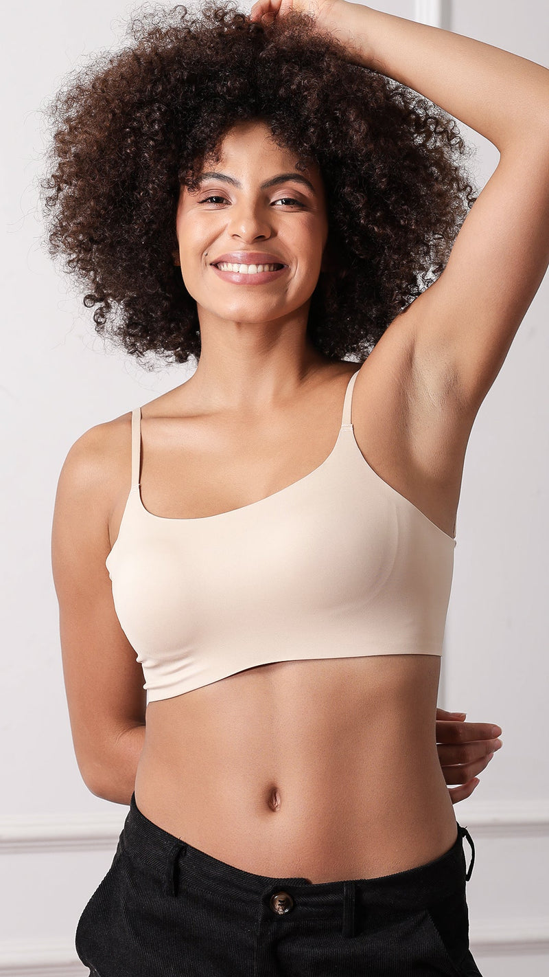 Seamless cami bralette with adjustable straps, front view on model